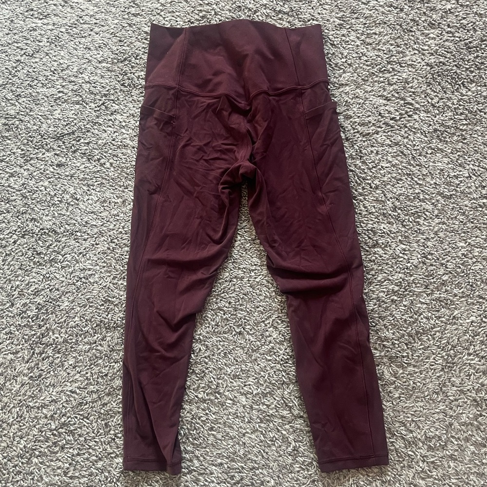 athleta salutation stash 7/8 tight